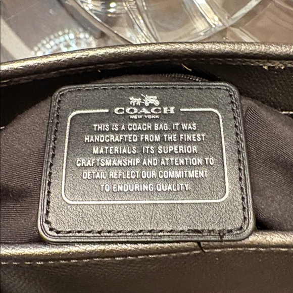 Coach City Zip Tote in a metallic finish, likely Metallic Silver / Gunmetal